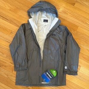 Patagonia raincoat, size medium (kids’ 10) NWT